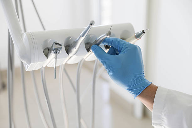 Professional Tooth Extraction technician working in Avery Creek, NC